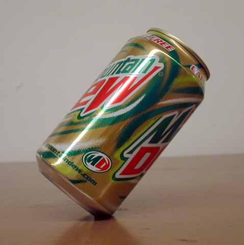 soda can balancing on beveled lower edge