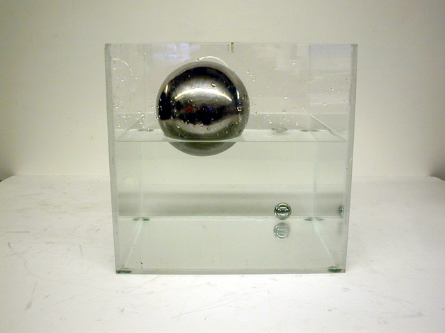 Density balls in a tank of water 