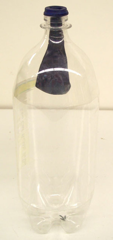 uninflated balloon in a bottle