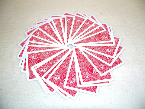 playing cards, face down in a spiral