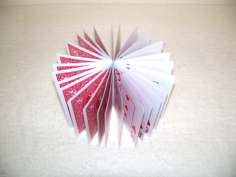 playing cards, on edge in a spiral