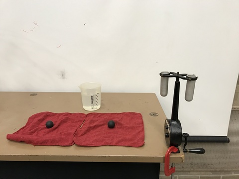 setup for centrifuge demo, towels, clamp