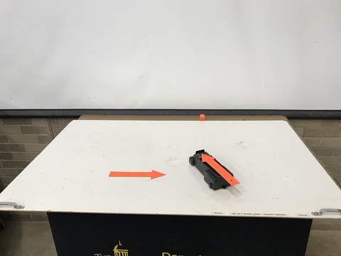 Car on a moving sheet with arrows - 1E10.10a.JPG