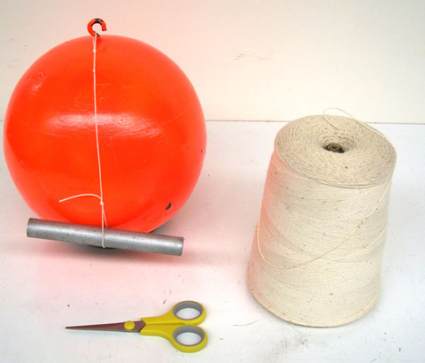 Bowling ball, string, handle, scissors