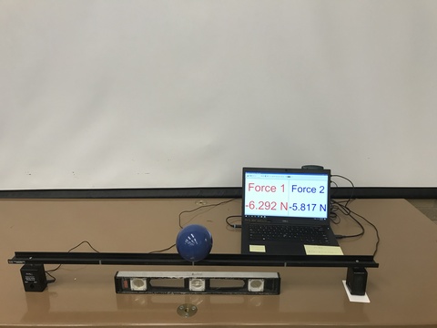 Pasco Dynamics track, blue sphere, laptop showing force