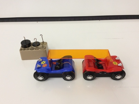  Cars connected using Plexiglass and Weights