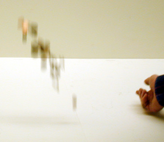 pennies being thrown into the air