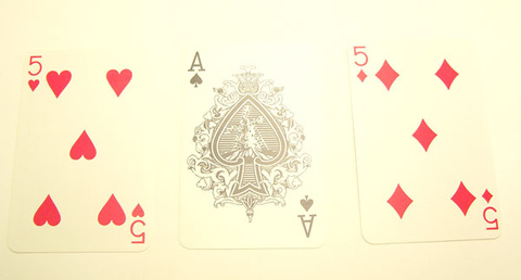 three playing cards face up