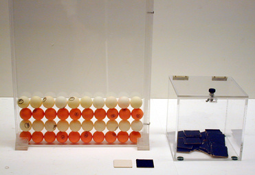 Ping Pong ball demo with distinct rows, box with black and white cards