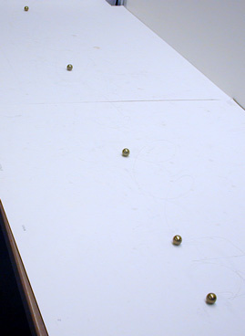 Weights Tied to Fishing Line at Prescribed Intervals