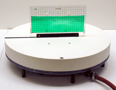 rotating air table with water parabola demo setup