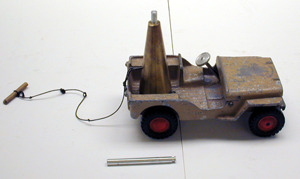Jeep with Spring-Loaded Gun and Metal Rod for Gun.