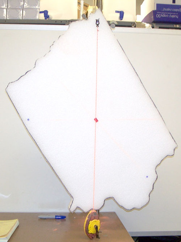 Styrofoam backing in the shape of an Iowa map, chalk line