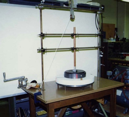 Rotating Air Table, Rotating Plate with Added Lead Strips, Compressed Air, Winch, Pulleys, Gloves, and Table Rod Stand for Pivot Pulley.