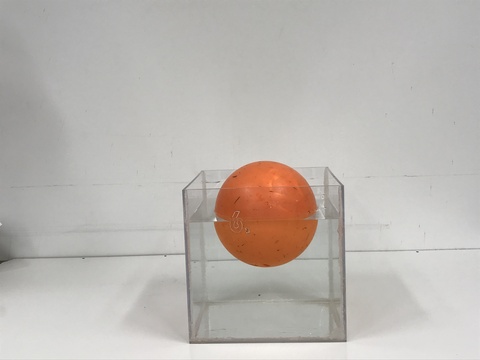 Bowling ball in water floating 
