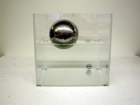 Density balls in a tank of water 