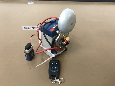 Bell jar with sorbothane pad, vacuum pump, 6 volt battery with attached doorbell