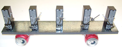 Metronomes, pop cans, foam board