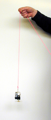 Motor with battery pack on a fishing swivel