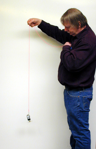 Motor with battery pack on a fishing swivel