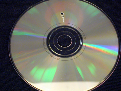 CD with holes of increasing size