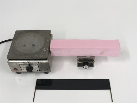 small lab jack with attached pink insulating foam.