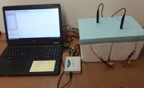 Heat Transfer Apparatus with Aluminum Bars and Styrofoam Containers