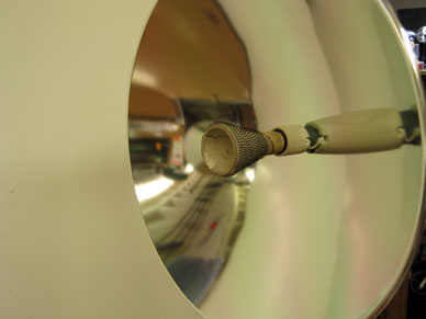  Parabolic mirror with heater coil assembly