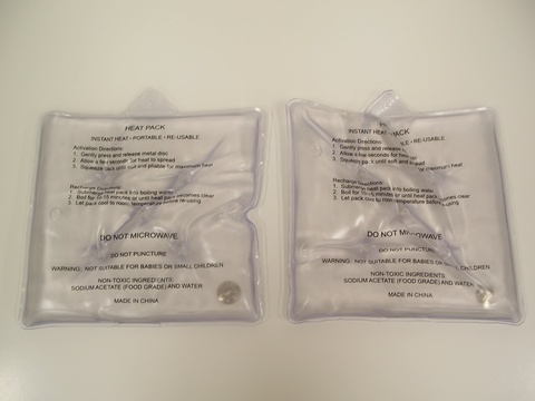 Re-HeaterTM Portable Heat Packs Containing Sodium Acetate.