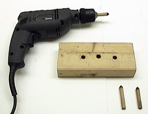 2 X 4, pointed dowels, and 3/8" drill