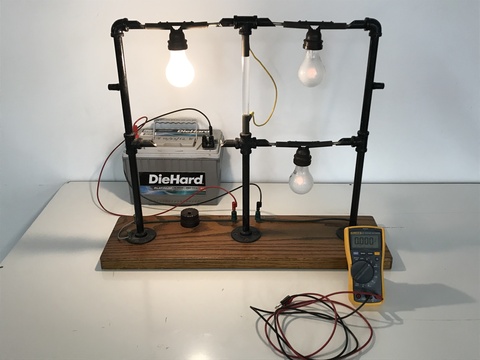 John Prineas - Three 50 Watt bulbs bottom bulb connected