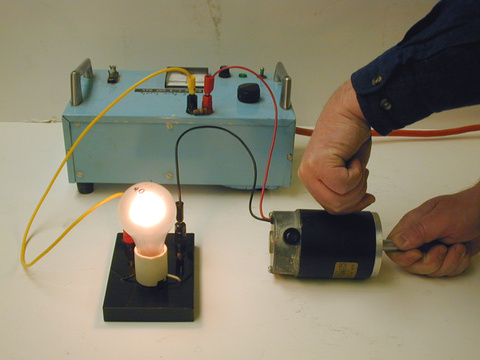 DC Motor, 40 Watt light bulb, and DC power supply