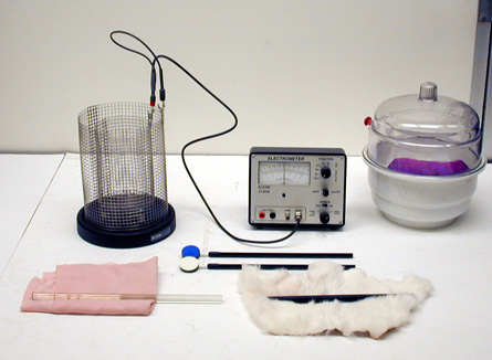 Ebonite Rod, Lucite Rod, Glass Rod, Cats Fur, Silk, Latex Rubber, Desiccators with Drying Agent, Electrometer, Wire Cage and Charging Paddle