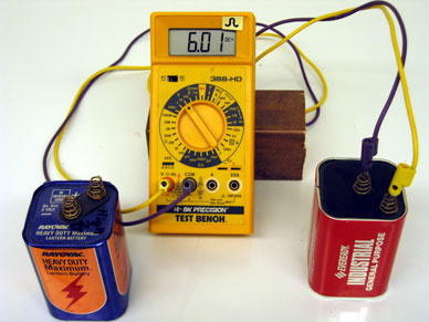 BK meter, One old and one new six volt battery
