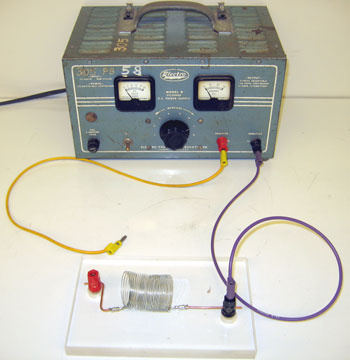 Car battery, 40 amp power supply, overhead slinky apparatus