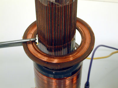 Electromagnet Coil, Iron Cores, Variac, Ring with groove Close up 