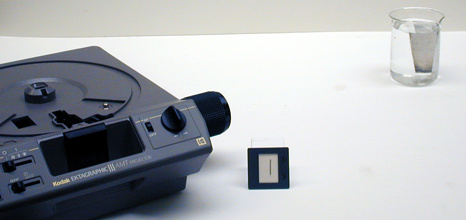 Projector and Beaker of Water