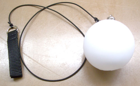 Ball connected to a rope