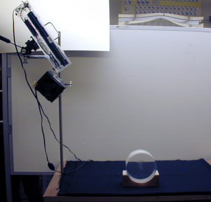 setup for rainbow and raindrop demo, black dropcloth, laser