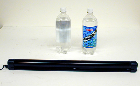 bottles of tonic water, black light
