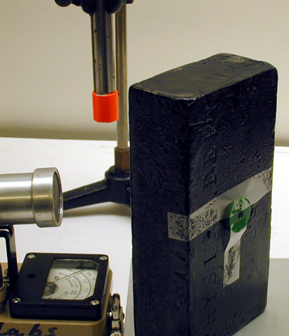 Survey Meter, Lead brick with hole, Large Neodymium Magnet, Strontium 90 Source, Amplifier & Speaker, Lab Jack.