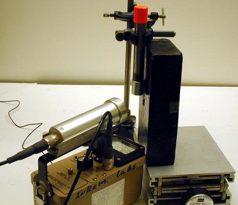 Survey Meter, Lead brick with hole, Large Neodymium Magnet, Strontium 90 Source, Amplifier & Speaker, Lab Jack.