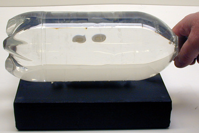 8" X 8" X 2" high block, 2 L bottle full of water, 2 large coins.