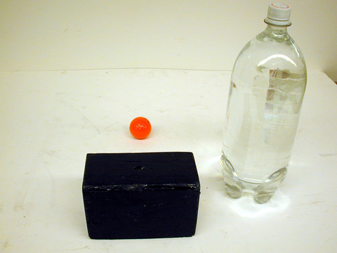 8" X 8" X 2" high block, 2 L bottle full of water, 2 large coins.