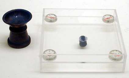 Overhead Magnets, Iron Filings, Iron Filings in Pop Bottles with Inserted Test Tube, Neodymium Magnets, and Dip Needles.