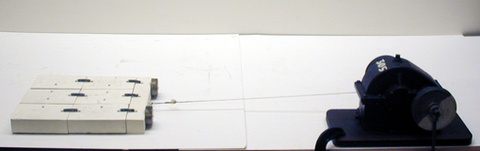 Earthquake model blocks and springs attached to a gear drive