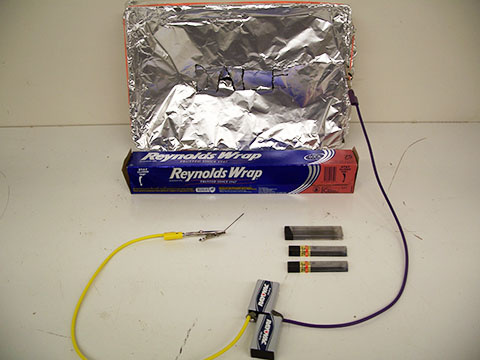 set up for Baby Plasma Cutter: 9 volt battery, Pencil Leads, clips, and aluminum Foil.
