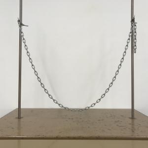 chain hung between two support rods
